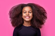 Smiling beautiful african girl with healthy white teeth. Smile little american girl. Girl smile and curly hair. Laughing cute afro girl portrait. 
