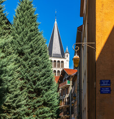 Wall Mural - Notre Dame de Liesse Church, and its magnificent bell tower, passage of the cathedral, in Annecy, Haute Savoie, France.