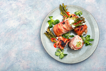 Wall Mural - Meat rolls stuffed young green asparagus.