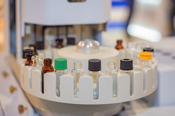 Poster - medical centrifuge. laboratory equipment. centrifuge for chemical experiments. glass bottles inside 