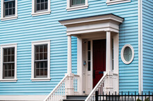 Blue House With Red Door In Manhattan