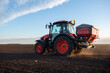 © Vesna - Tractor spreading artificial fertilizers