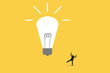 © Aan - Businessman happy look lightbulb. Concept of New idea, brainstorming, innovation, success