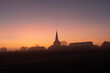 © Sebastian Staak - Sonnenuntergang über der Kirche im Dorf, Deutschland