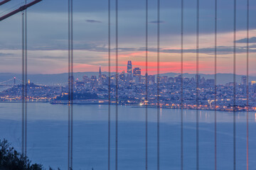  San Francisco Skyline with Fading Dawn Light During Morning Twilight Behind Famous Bridge
