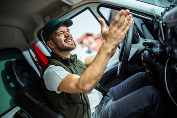 Wall Mural - An angry truck driver is driving a truck and is annoyed with people who disturb the traffic