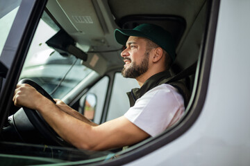 Wall Mural - An angry truck driver is driving a truck and is annoyed with people who disturb the traffic