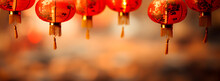 Red Chinese Lanterns With Golden Patterns And Tassels, Softly Lit With A Warm, Blurred Background, Creating A Festive And Traditional Atmosphere