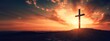 Crucifixion Of Jesus Christ At Sunrise -a christian cross on top of a Hill at sunset, easter and christian concept, horizontal background, copy space for text