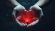 Closeup hands holding red heart for healthy donate concept