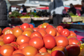 Tomatoes for sale in a market.