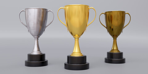 Wall Mural - Gold silver bronze trophy cup with dual handle on grey background. Shiny metallic reward. 3d render