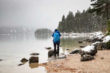 Wall Mural - foggy lake in winter snowfall