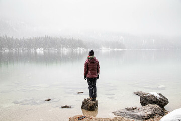 Wall Mural - foggy lake in winter snowfall