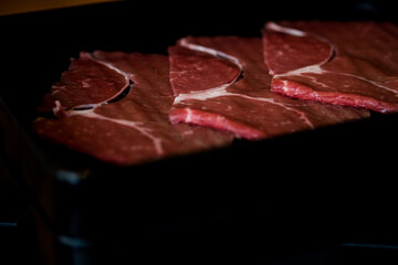 Wall Mural - Close up of raw meat in black tray for yakiniku Japanese style