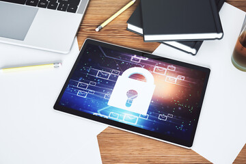 Poster - Top view of modern digital tablet monitor with creative lock hologram and email symbols. Information security concept. 3D Rendering