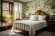 © Nino Lavrenkova - A charming bed and breakfast guest room with floral wallpaper, antique furniture, and lace curtains