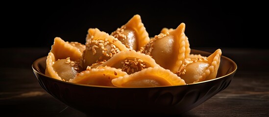 Indian sweet dumplings called Gujiya are traditionally made for the Holi Festival.