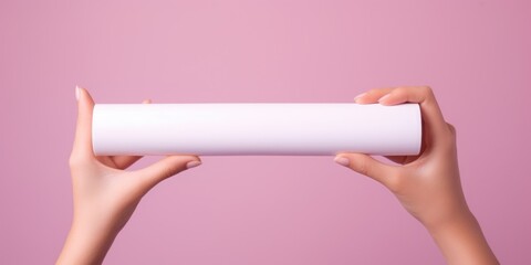 Poster - A person is seen holding a white object. This versatile image can be used in various contexts