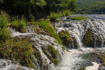 Wall Mural - Strbacki Buk, a terraced waterfall on the Una River on the border between the Federation of Bosnia and Herzegovina and Croatia. Early September