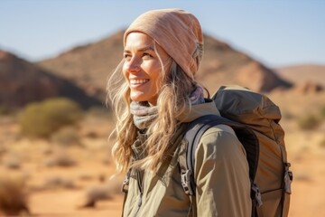 Wall Mural - Hiking woman in the desert of Namib Naukluft National Park in Namibia