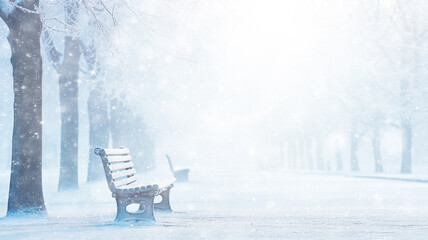 Wall Mural - snowfall winter landscape, park bench, abstract background copy space, blurred light white snow falling, christmas postcard view