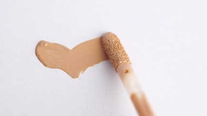 Poster - Concealer smears on white background. Cosmetic seample. Foundation swatch.