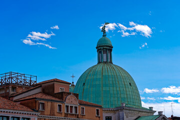 Old town of Venice with dome of church San Simeon Piccolo on a blue cloudy summer day. Photo taken August 6th, 2023, Venice, Italy.