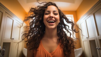 Wall Mural - Cute and happy Hispanic young woman doing self hair treatment after bath