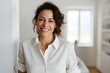 © Markus Schröder - Portrait of a smiling woman in her 40s sporting a vented fishing shirt against a modern minimalist interior. AI Generation