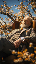 Generative AI Illustration Low Angle Of Elderly Gentleman Napping In A Vintage Chair Under A Blooming Tree With A Serene Expression On His Face