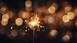 © shooreeq - Burning Christmas sparkler lights on dark bokeh background