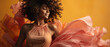 Beautiful sensual african american woman in pink dress with flying fabric on yellow