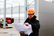 construction site engineer worker. Portrait of young worker in helmet