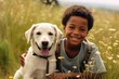 Smiling portrait of a young boy with pet dog in park