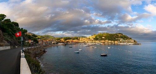 Sticker - panorama view of the harbor marina and Porto Azzurro village on Elba Island at sunset