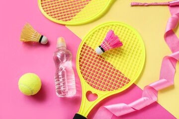 Composition with bottle of water and different sports equipment on color background