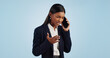 Business, phone call and woman with stress, angry and employee isolated on a blue studio background. Mockup space, person and entrepreneur with a smartphone, connection and frustrated with emotions