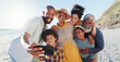 © Wesley JvR/peopleimages.com - Love, selfie and happy family at a beach for travel, fun or adventure in nature together. Ocean, profile picture and African kids with parents and grandparents at the sea for summer, vacation or trip
