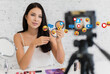 © Art_Photo - Smiling pretty woman beauty clean fresh healthy white skin blogger in front of camera recording video content for live stream chat talking with makeup cosmetic for internet social network at home