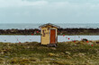 Fishing shack in coastal landsacape in southwest Iceland 
