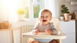 © Zephyr-Imagix  - Happy toddler enjoying a healthy meal with a cute smile.