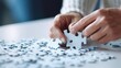 © CStock - people hands holding and putting puzzle pieces,,