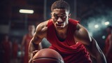 Fototapeta Sport - Young male basketball player dribbling the ball on basketball court in action.