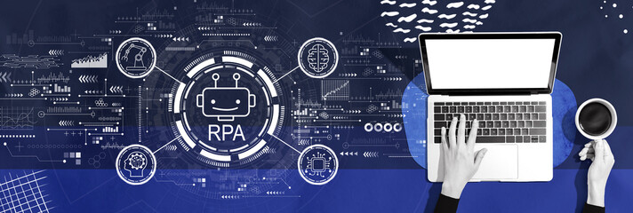 Wall Mural - Robotic Process Automation RPA theme with person using a laptop computer