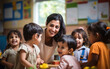 © PRASANNAPIX - young indian teacher with little students