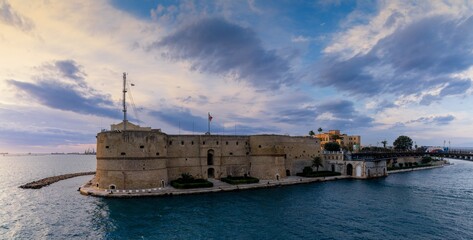 Wall Mural - view of the Castello Aragonese fortress in the harbor of Taranto in Apulia