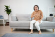senior woman pain suffering from heart disease on sofa