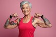An older woman showcasing her strength by flexing her muscles. This image can be used to promote fitness and healthy aging