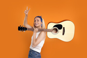 Wall Mural - Happy hippie woman with guitar showing peace sign on orange background